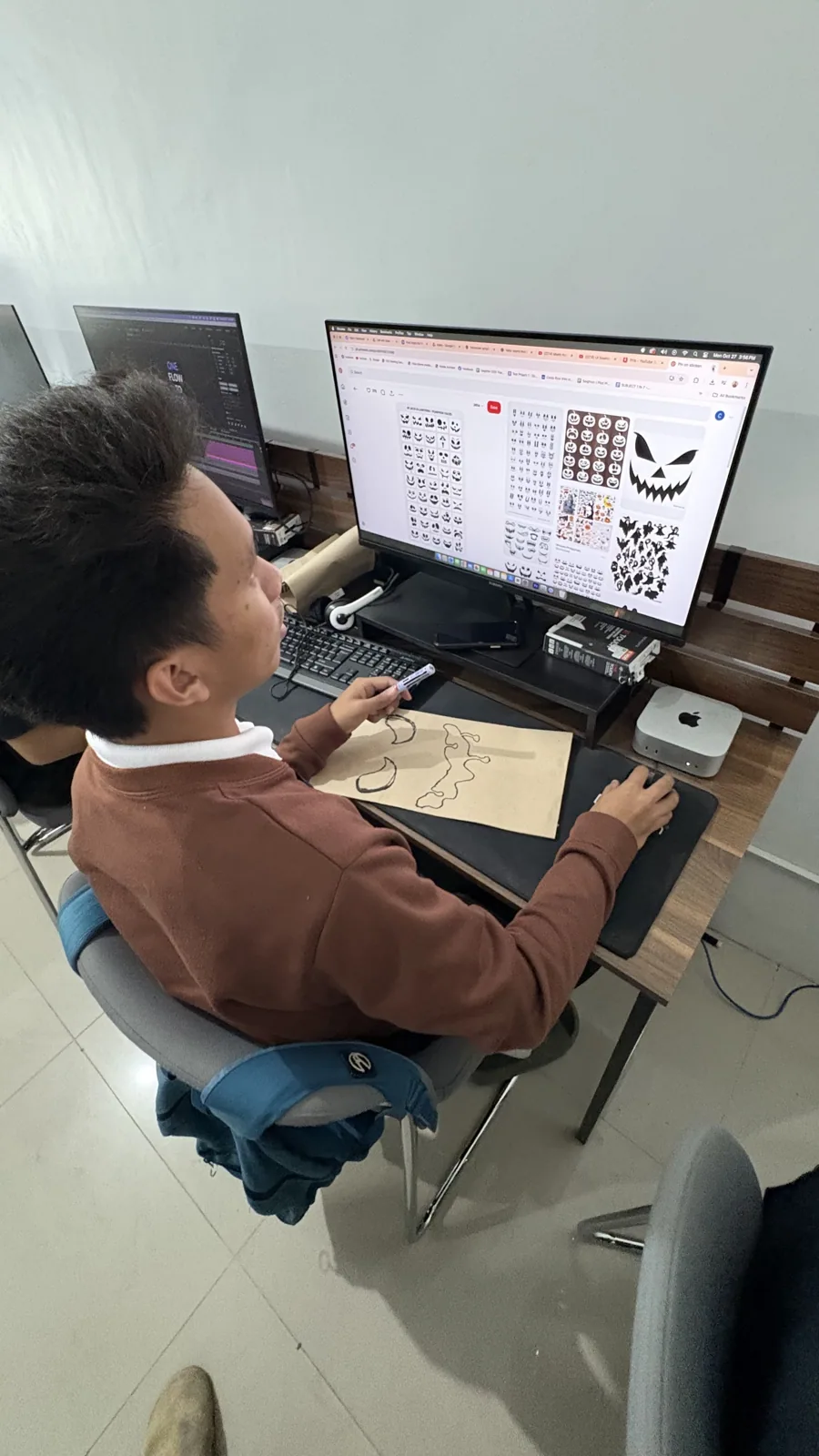 A creative associate at work on a design