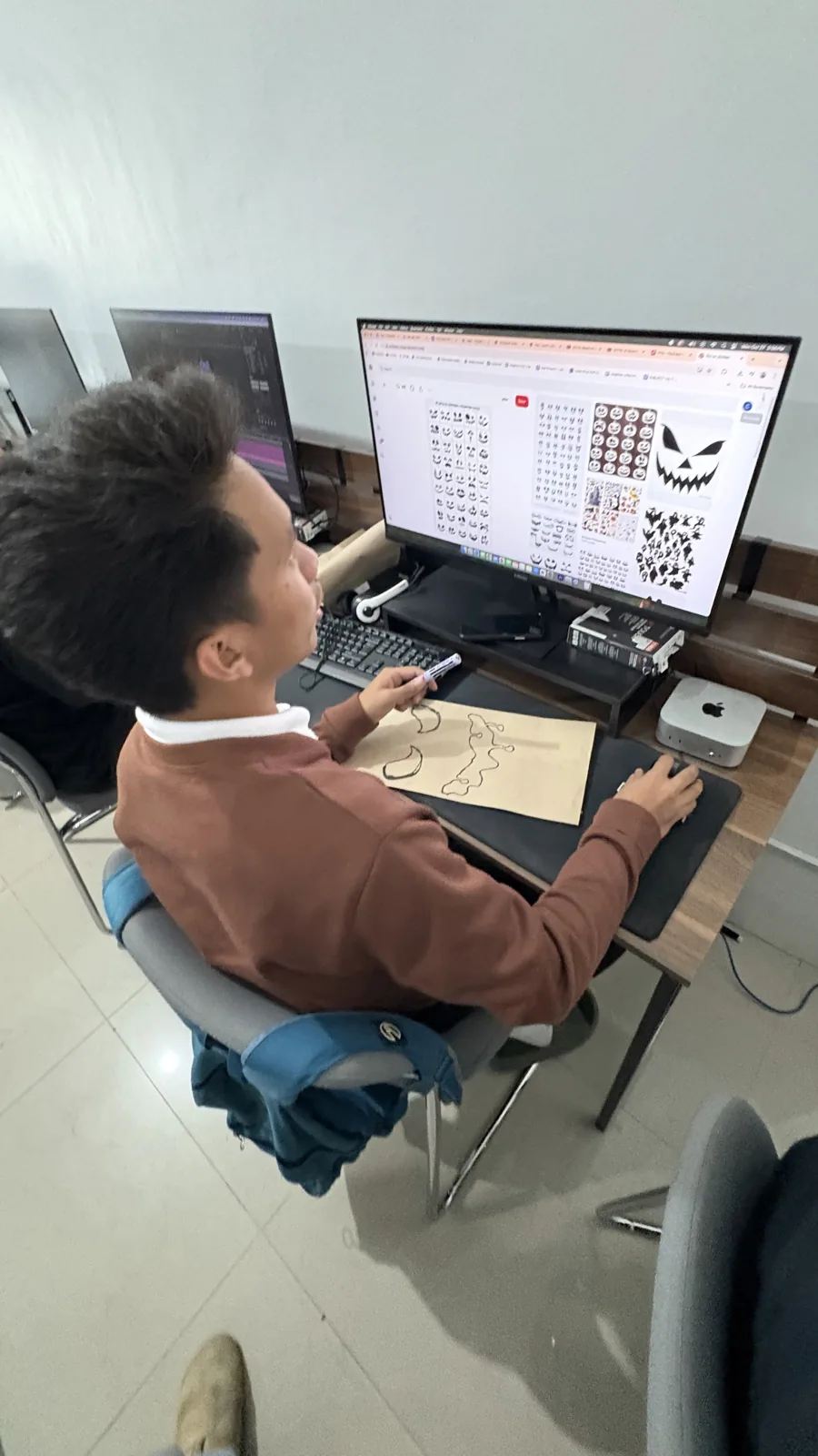 A designer at work on the floor