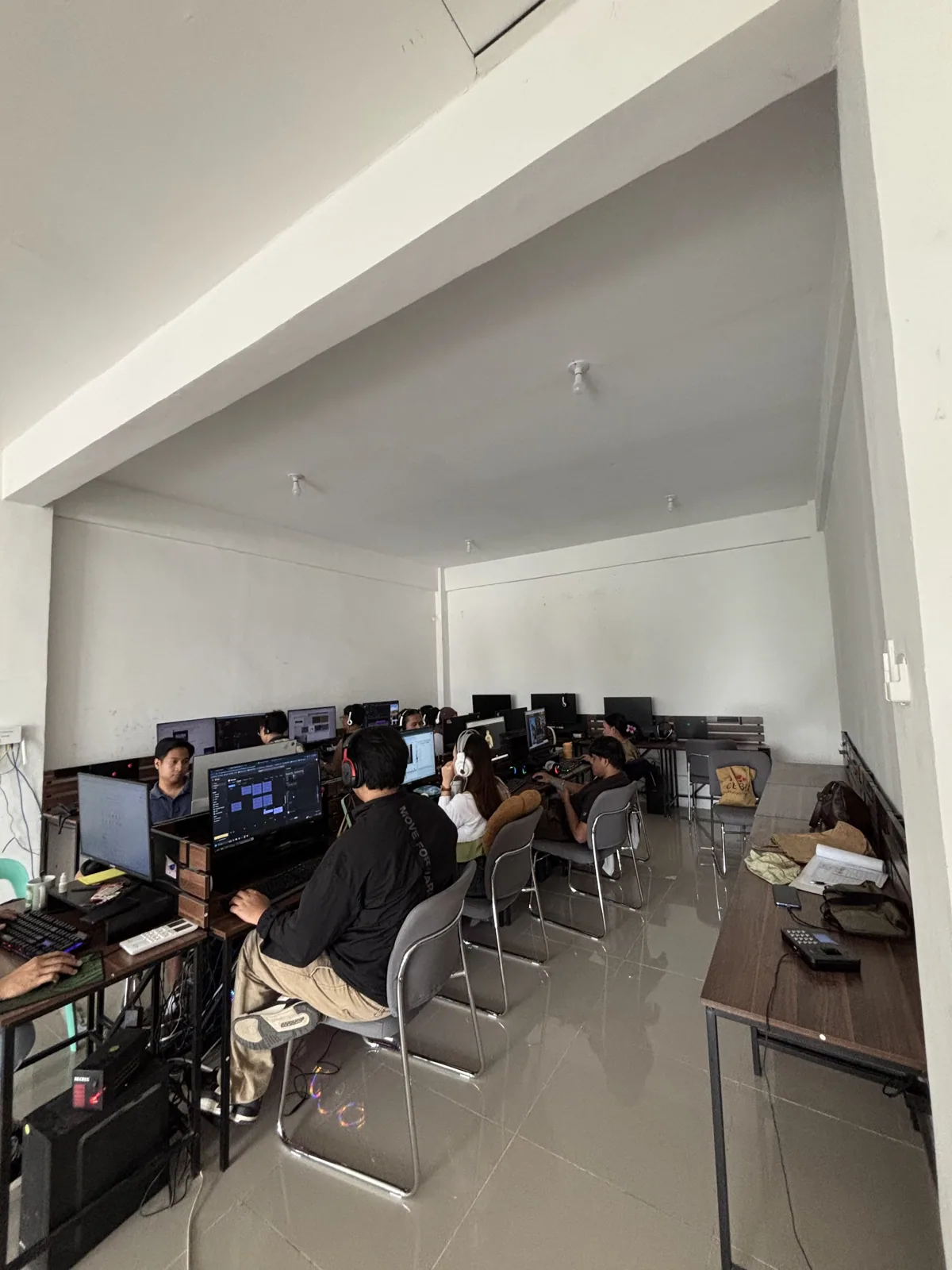 Rows of workstations in use during a shift