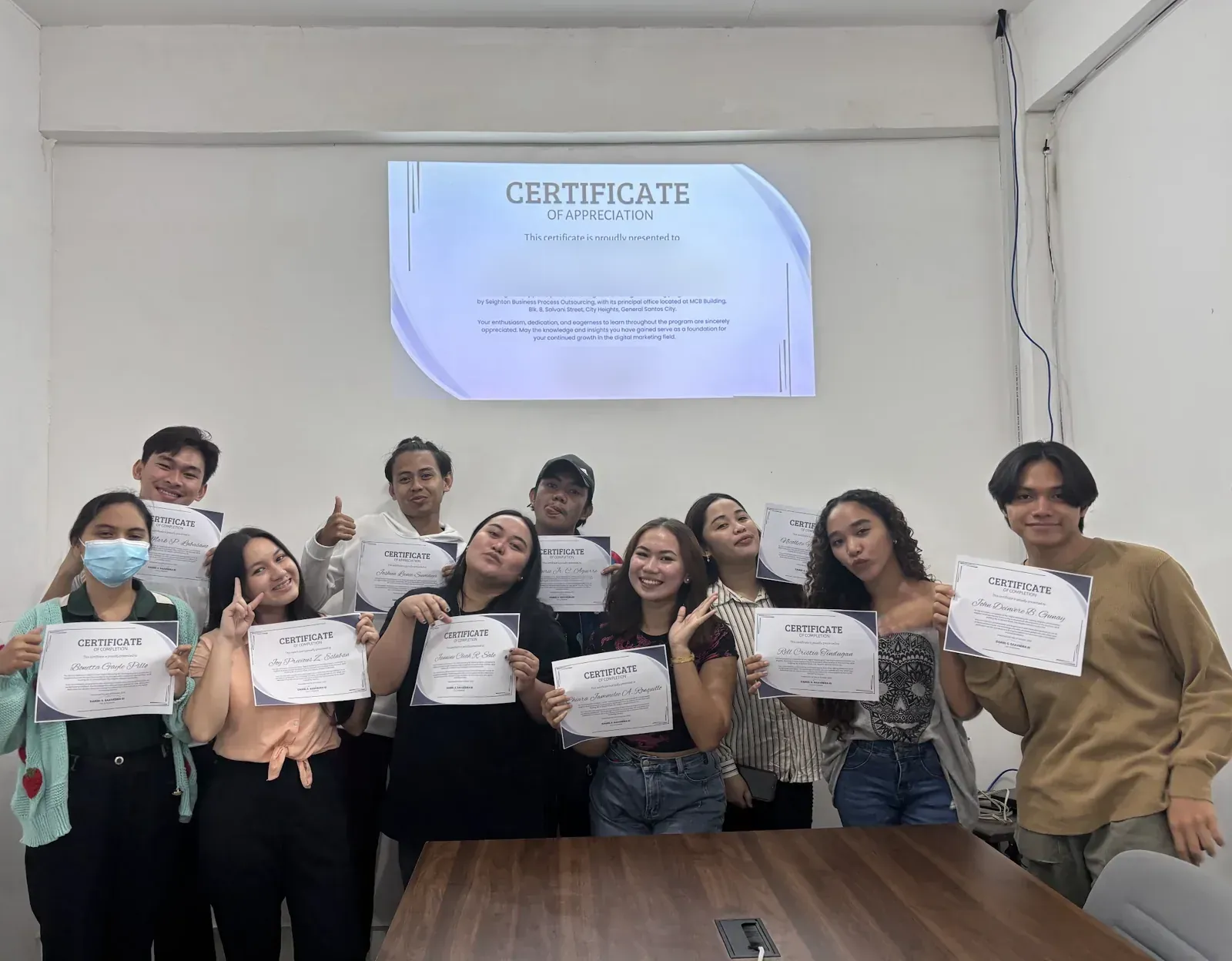 Associates holding certificates at the recognition program