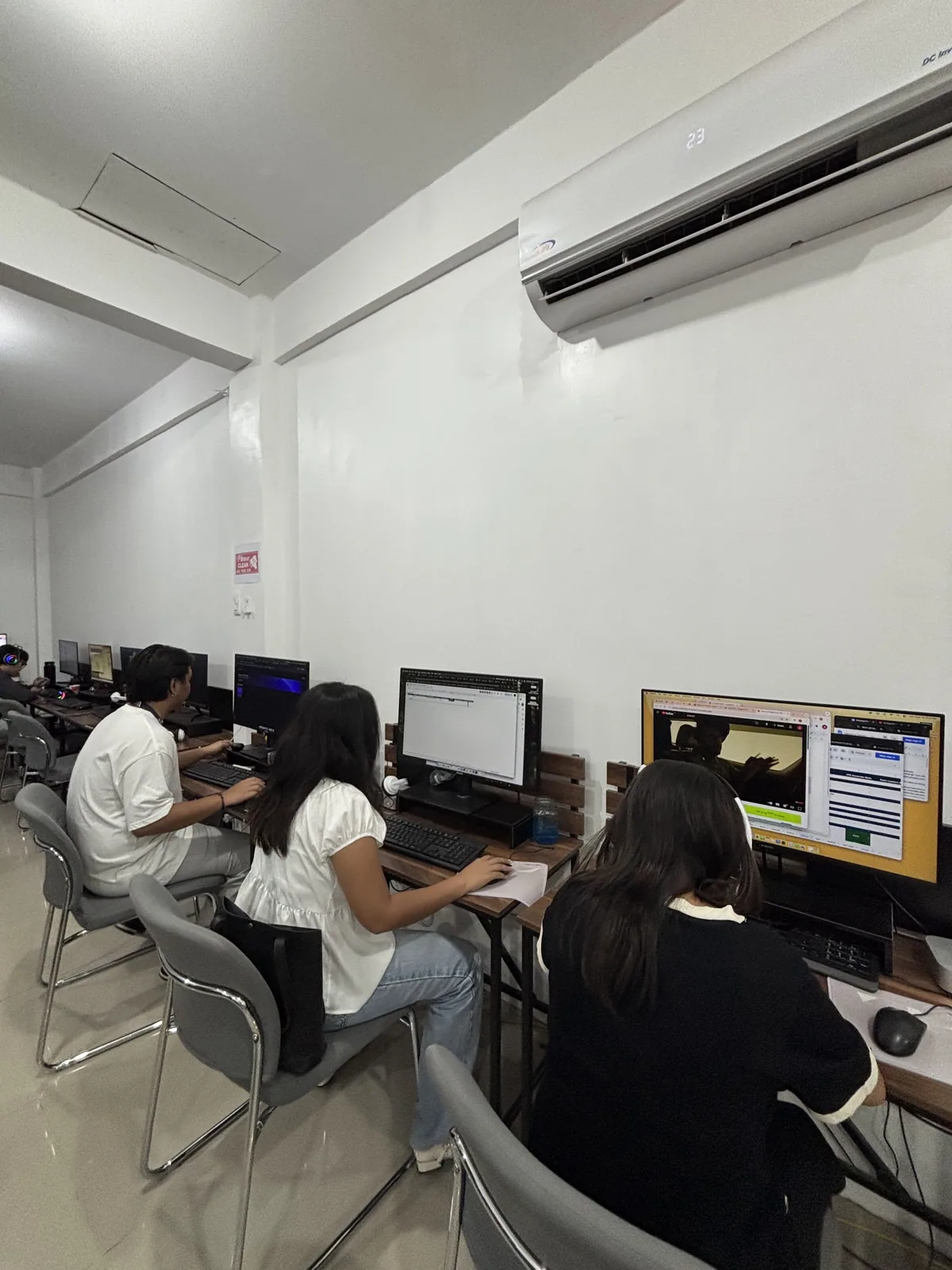 Two associates working side by side